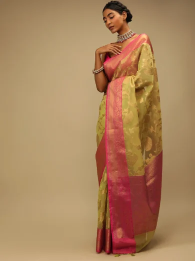 Celery Green Saree In Organza Silk With Golden Brocade Woven Floral Jaal And Magenta Border Design